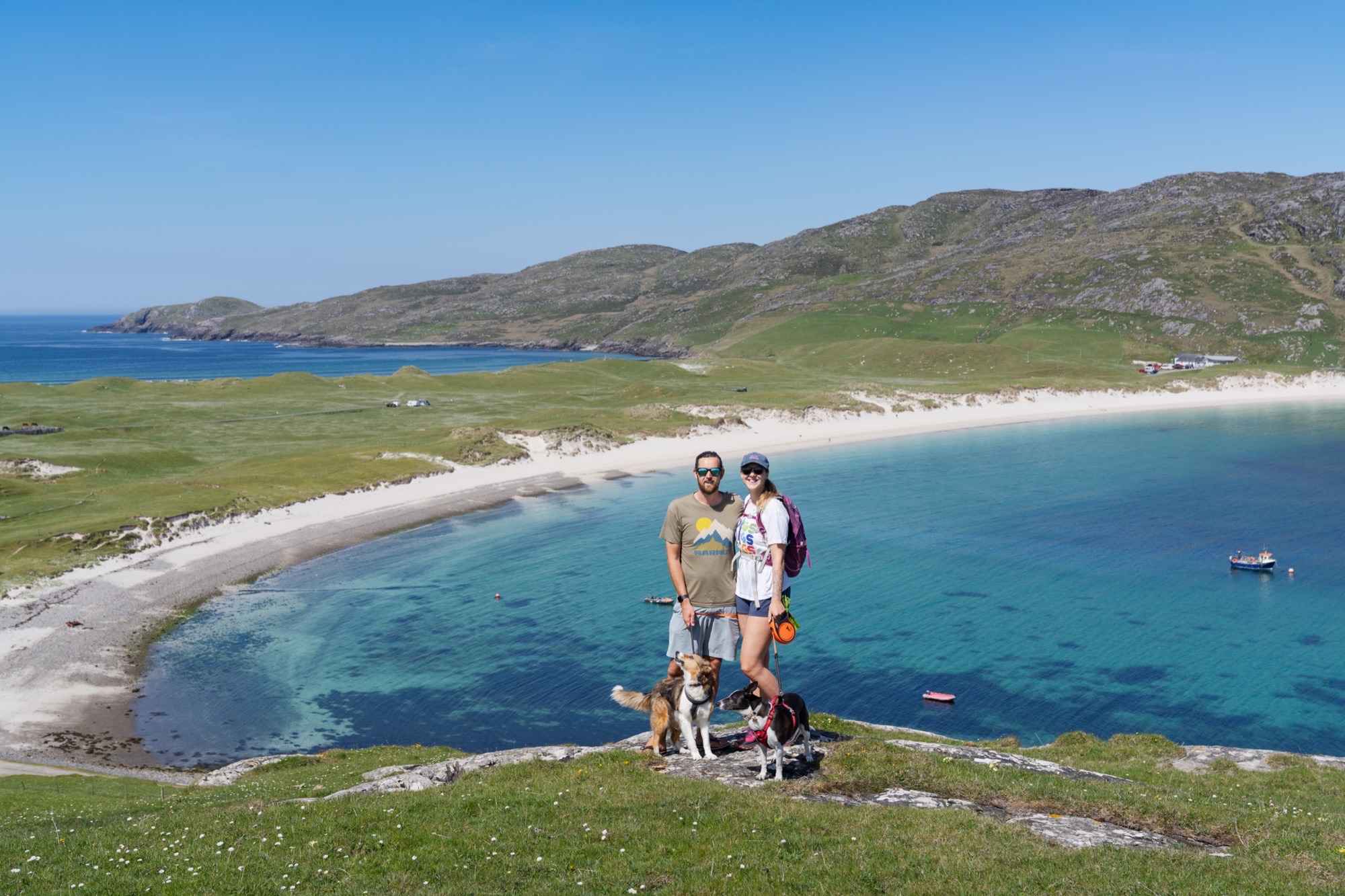 Jess, Marcus, Rory and Jeannie overlooking a turquoise bay